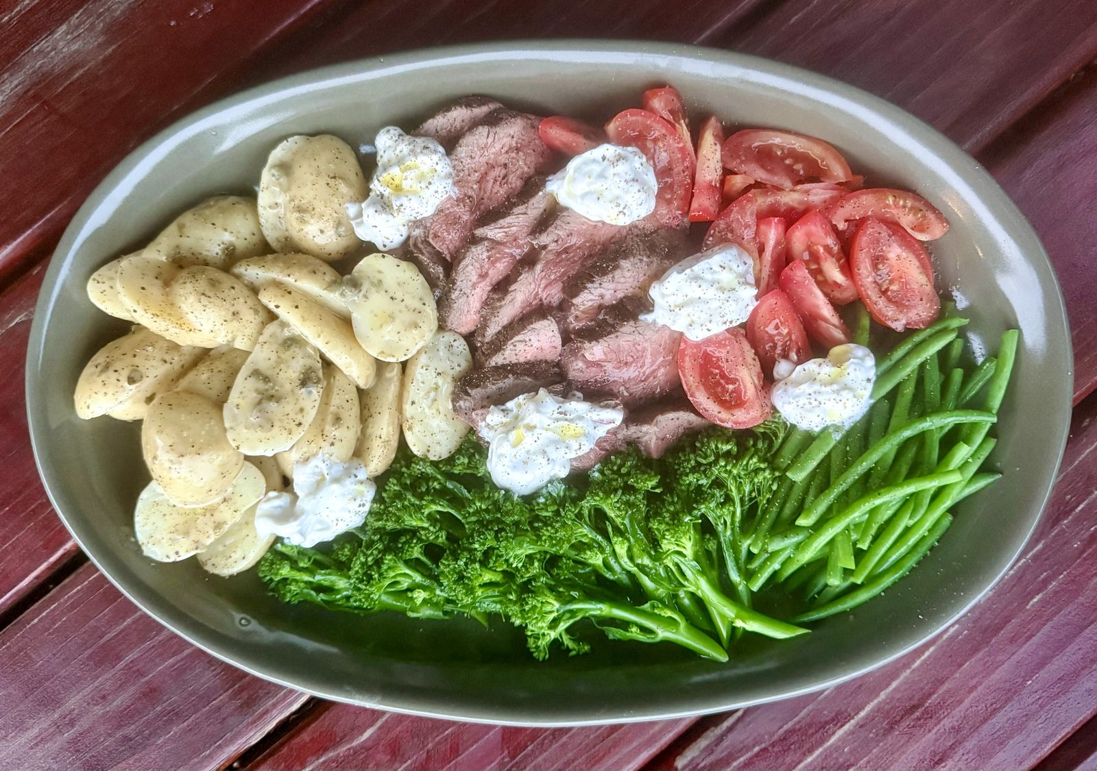Steak salad with potatoes, broccoli, green beans, tomatoes