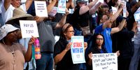UCT staff holding up signs during the UCT Employees Union strike. (Photo: Gallo Images / Misha Jordaan)