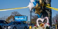 CHESAPEAKE, VA - NOVEMBER 23: A memorial is seen at the site of a fatal shooting in a Walmart on November 23, 2022 in Chesapeake, Virginia. Following the Tuesday night shooting, six people were killed, including the suspected gunman.  (Photo by Nathan Howard/Getty Images)