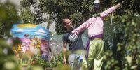 Werner Goerke   places a new scarecrow to the garden  in the Bo-Kaap .Picture Brenton Geach