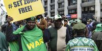 Supporters of South African former President Jacob Zuma gather as he appears in the Johannesburg High Court during his appeal against not being allowed to stand as an election candidate during the upcoming general elections to be held in May, in Johannesburg, South Africa, 08 April 2024. Former President Jacob Zuma left the ruling ANC (African National Congress) to back the MK party but due to the fact that Zuma has a criminal record, he may not stand for election and be a possible member of parliament. South Africa is due to hold general elections in May 2024.  EPA-EFE/KIM LUDBROOK