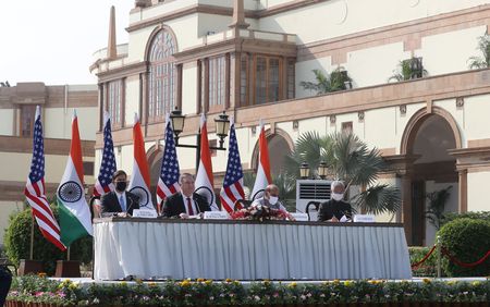 U.S. warns of threat posed by China, signs military pact with India
