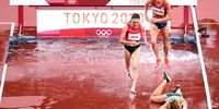 TOKYO, JAPAN - AUGUST 04: Genevieve Gregson of Team Australia lays injured during the Women's 3000m Steeplechase Final on day twelve of the Tokyo 2020 Olympic Games at Olympic Stadium on August 04, 2021 in Tokyo, Japan. (Photo by Matthias Hangst/Getty Images)