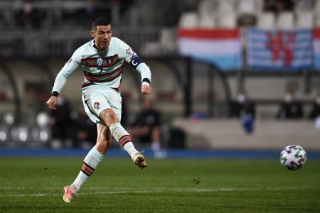 On the ball: Cristiano Ronaldo closes in on another scoring record