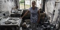 Karen Andrews standing in what remains of her kitchen.<br>Photo / Shiraaz Mohamed