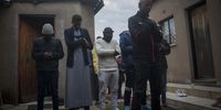 Abdul Rahman leads the Eid prayers in a courtyard of a house in Soweto. (Photo: Daily Maverick / Shiraaz Mohamed)