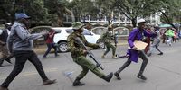 Kenyan small and medium enterprise traders are dispersed by police officers during a protest against Chinese nationals owning businesses that engage in import, manufacture and distribution, in Nairobi, Kenya, 28 February 2023. The protesting traders complain of what they called unfair business advantage for Chinese nationals in the country saying Chinese businesses are kicking the locals out of business.  EPA-EFE/Daniel Irungu