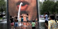  People cool off at Crown Fountain in Millennium Park as temperatures reached a record high of 97 degrees Fahrenheit on June 17, 2024 in Chicago, Illinois. Temperatures in the city are expected to reach highs in the 90s for the remainder of the week. (Photo by Scott Olson/Getty Images)