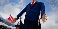 SARASOTA, FL - JULY 03: A man wears a costume depicting former U.S. President Donald Trump on July 3, 2021 in Sarasota, Florida. Co-sponsored by the Republican Party of Florida, the rally marks Trump's further support of the MAGA agenda and accomplishments of his administration. (Photo by Eva Marie Uzcategui/Getty Images)