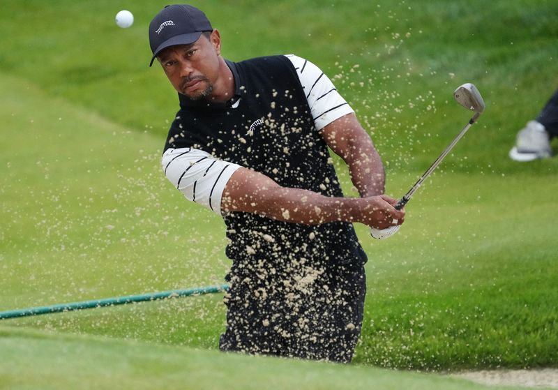 Golf — Woods says he is stepping away for treatment after DUI arrest