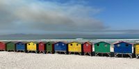 The day UCT and Rhodes Memorial burnt. 18.04.2021. Smokey Clouds over the Huts. Photo was also used by Noordhoek artist Nola Muller (@nolamullerza), for a painting currently on exhibit in Muizenberg part of the proceeds of the sale of the painting will go to the Beachhuts.org.