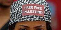 A person wears a bandana that reads 'free free Palestine' during a rally organised by the Communist Party of India (CPI) in support of the Palestinian people and against Israel for continuing the military campaign in the Gaza Strip, Mumbai, India, 20 August 2025.  EPA/DIVYAKANT SOLANKI