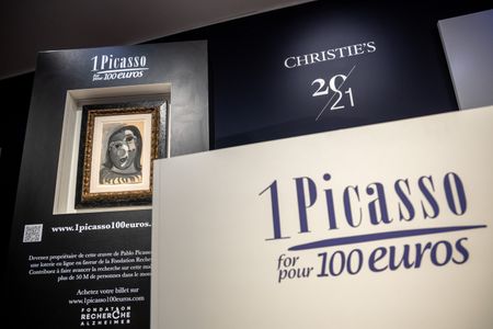 Claude Monet’s ‘Iris’ becomes most expensive artwork sold at auction in France, Sotheby’s says