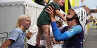 Latvian rider Krists Neilands of Israel - Premier Tech celebrates with his family after he finishes the 21st stage of the 2024 Tour de France cycling race over 33km Individual time-trial (ITT) from Monaco to Nice, 21 July 2024.  EPA-EFE/LAURENT CIPRIANI / POOL