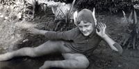 Wilson, at the age of 10, in the Puck costume that her drama mistress Joan Brickhill had worn when she herself played Puck at the age of 10. (Photo: Supplied)