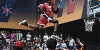 LAS VEGAS, NEVADA - AUGUST 17: Darius Clark #7 of Mob dunks against the Lava during a SlamBall game at the Cox Pavilion on August 17, 2023 in Las Vegas, Nevada. (Photo by Candice Ward/Getty Images for SlamBall)