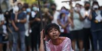 epa09890897 A Filipino Catholic from a parish youth council portraying Jesus Christ performs in the 'Senakulo,' a depiction of events in the crucifixion and death of Jesus Christ in observance of Good Friday of Lent at a residential village in Quezon City, Metro Manila, Philippines, 15 April 2022. Filipino Catholics join other faithful around the world in observing Holy Week in the Lent season which runs from Palm Sunday to Easter Sunday.  EPA-EFE/ROLEX DELA PENA