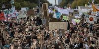 BERLIN, GERMANY - SEPTEMBER 20: Participants in the Fridays For Future movement protest during a nationwide climate change action day in front of the Brandenburg Gate on September 20, 2019 in Berlin, Germany. Fridays for Future protests and strikes are registered today in over 400 cities across Germany. The activists are demanding that the German government and corporations take a fast-track policy route towards lowering CO2 emissions and combating the warming of the Earth's temperatures. (Photo by Maja Hitij/Getty Images)