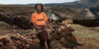 Mataso Makone, the Widow of Molupe Makone, is 51 years old and lives in Butha Buthe, Lesotho. Her husband worked on the mines for 33 years, between 1974 and 2007 and died from tuberculosis in 2011. He was retrenched due to his medical condition but never received any compensation. Now she has to survive with money she receives from her daughters who are domestic workers in South Africa. Speaking about why she married a miner she said that they met when she was 16, he sent a friend to tell her that he was interested. “I liked him a lot also,” she said. “Since he was already working I felt safe with him because I knew he was going to provide”.
