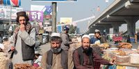 These Pashtun men run an open-air dried fruit market alongside the main road in Gujranwala City, Pakistan, in what is supposed to be a bus stop. It was captured on a bright, sunny day in winter and is a reflection of life in the city. Image: © Muhammad Saddique Inam, Pakistan, Winner, National Awards, Sony World Photography Awards 2024