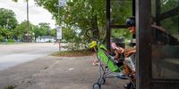 HOUSTON, TEXAS - JULY 21: Dawnsha Johnson cools her son Javon with a portable fan during a heatwave on July 21, 2022 in Houston, Texas. Excessive heat warnings have been issued across Texas with a predicted high of 102 degrees in Houston. (Photo by Brandon Bell/Getty Images)