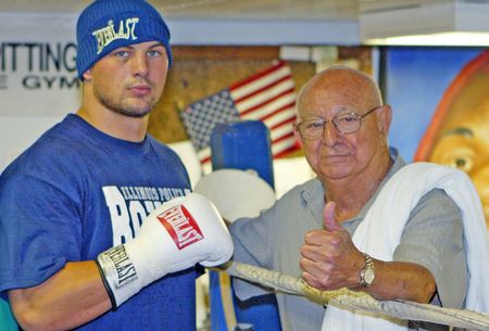 Ali's legendary trainer Angelo Dundee leaves ringside at 90
