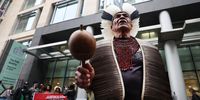  Brazilian Indigenous tribal chief demonstrates against the Mariana Dam disaster outside London’s High Court in London, Britain, 21 October 2024. The Mariana Dam disaster occurred on 5 November 2015 in Brazil, devastating numerous villages and killing nineteen people. The extent of the damage caused by the dam collapse is the largest ever recorded in Brazil. The civil trial beginning in London 21 October will determine whether the Anglo-Australian company BHP is responsible. The claimants' lawyers argued successfully that the trial should be held in London because BHP headquarters 'were in the UK at the time of the dam collapse'.  EPA-EFE/ANDY RAIN