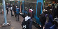 Commuters board an already full train at the Shallcross train station near Chatsworth, south of Durban on 21 June, 2023. (Photo: Phumlani Thabethe)