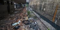 A deserted Jeppe station in Johannesburg, where chunks of tar have been ripped away to allow vandals access to cables. (Photo: Shiraaz Mohamed)