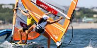 FUJISAWA, JAPAN - JULY 24:  Dilara Urtalip of Turkey takes a fall in the Women's RS:X Windsurfing practice on day one of the Tokyo 2020 Olympic Games at Enoshima Yacht Harbour on July 24, 2021 in Fujisawa, Kanagawa, Japan. (Photo by Phil Walter/Getty Images)