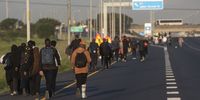 Hundreds of people were seen walking home  on the N2 on August 03, 2023 in Cape Town, South Africa. Commuters were left stranded after taxi operators went on strike Thursday afternoon. Impoundments of minibus taxis has led to a protest by taxi drivers. (Photo by Gallo Images/Brenton Geach)
