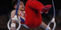 epaselect epa09362198 Carlos Edriel Yulo of Philippines performs during the men's Rings Qualification in Artistic Gymnastics events of for the Tokyo 2020 Olympic Games? at the Ariake Gymnastics Centre in Tokyo, Japan, 24 July 2021.  EPA-EFE/TATYANA ZENKOVICH