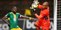 Ricardo Goss (GK) of Siwelele FC is challenged by Junior Dion, Captain of Golden Arrows during the Betway Premiership match between Golden Arrows and Siwelele FC at King Goodwill Zwelithini Stadium on April 24, 2026 in Durban, South Africa. (Photo: Gerhard Duraan / Gallo Images)