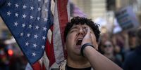 Demonstrators protest the agenda of the Trump administration with a march through downtown on September 30, 2025 in Chicago, Illinois. The protest was organized on the heels of recent ICE raids in the city, including an overnight raid on an apartment building early this morning. (Photo by Scott Olson/Getty Images)