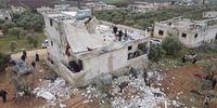 epa09724582 An aerial picture taken by a drone shows people inspecting a damaged building after an alleged counterterrorism operation by US Special forces in the early morning in Atma village in the northern countryside of Idlib, Syria, 03 February 2022. Pentagon Press Secretary John Kirby said that 'U.S. Special Operations forces under the control of U.S. Central Command conducted a counterterrorism mission in northwest Syria'. The Britain-based Syrian Observatory for Human Rights reported that there were 'confirmed reports of fatalities', but did not provide numbers or identities.  EPA-EFE/YAHYA NEMAH