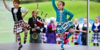 Highland dancers compete during the Argyllshire Gathering on August 28, 2025 in Oban, Scotland. The Oban Games, a day of intense Highland rivalries and competition, are a key part of the historic Argyllshire Gathering. Founded in 1871, the Gathering began as a way to unite the clans of Argyll — a region encompassing over 20 islands on the western coast of Scotland — through traditional Highland sports. Over time, it has evolved into an annual summer celebration of Scottish heritage and community. (Photo by Jeff J Mitchell/Getty Images)