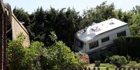 epaselect epa06744412 A caravan trailer is blown into a hedge in Viersen, Germany, 17 May 2018, after what was reported as a 'tornado' left a swath of destruction near the city around 40 miles west of Dusseldorf. The twister storm reportedly lasted between 10 to 15 minutes and caused severe damage to around 50 houses on its route.  EPA-EFE/FRIEDEMANN VOGEL