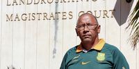 Billy Claasen, executive director of the nonprofit Rural and Farmworkers Development Organisation, stands outside Vredendal Magistrates’ Court. (Photo: Tamsin Metelerkamp)