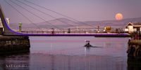 Almost full moon over the Clocktower Bridge Waterfront Cape Town. Image: Nat Gold ZA
