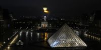 The cauldron, with the Olympic flame lit, lifts off while attached to a balloon during the Opening Ceremony of the Olympic Games Paris 2024 on July 26, 2024 in Paris, France. (Photo by Ricardo Mazalan-Pool/Getty Images)