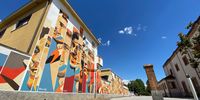 MILAN, ITALY - MAY 19: A general view of a Graffiti on a wall of Ortica District on May 19, 2021 in Milan, Italy. The Or.Me project, with the help of worldwide famous artists, is drawing graffiti over the Ortica district to tell the stories of the protagonists of the 20th century.  (Photo by Vittorio Zunino Celotto/Getty Images)