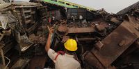 The National Disaster Response Force Rescue continues work at the site of a train accident at Odisha Balasore, India, 03 June 2023. Over 200 people died and more than 900 were injured after three trains collided one after another. According to railway officials the Coromandel Express, which operates between Kolkata and Chennai, crashed into the Howrah Superfast Express.  EPA-EFE/PIYAL ADHIKARY REISSUED WITH ALTERNATE CROP