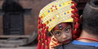 A Nepalese girl in traditional attire takes part in Kumari Puja, a mass worship ceremony for preteen girls, in Kathmandu, Nepal, 27 September 2023. In Nepal, Kumari Puja is the tradition of selecting a Kumari, usually a preadolescent girl, to worship symbolically as a goddess. More than hundred girls under the age of nine from across the country gathered for the mass worship. Performing Kumari Puja for three continuous years is believed to protect the girls from diseases throughout their entire life.  EPA-EFE/NARENDRA SHRESTHA