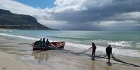 Trek fishermen Fish Hoek beach. Image: Jane Turner