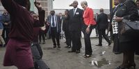 British Prime Minister Theresa May (C) is greeted by school children during her visit to the ID Mkhize Secondary School in Gugulethu, Cape Town, South Africa, 28 August 2018. British Prime Minister May started a working visit to South Africa to strengthen bilateral relations and business ties. Prime Minister May will also visit Nigeria and Kenya.  EPA-EFE/RODGER BOSCH / POOL