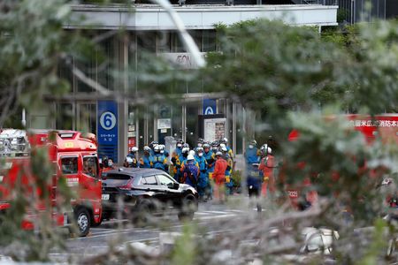 Japan quake toll rises to 13 as rescuers haul people from collapsed mall