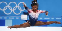 Simone Biles of the US competes in the women’s balance beam final during the artistic gymnastics events at the Tokyo 2020 Olympic Games on 3 August 2021. (Photo: EPA-EFE / Tatyana Zenkovich)