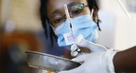 South Africa's vaccination roll-out gets under way as Ramaphosa and healthcare workers get their jabs