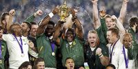 South African captain Siya Kolisi (C-L) and South African president Cyril Ramaphosa (C-R) hold the cup as the team celebrates winning the Rugby World Cup final match between England and South Africa at the International Stadium Yokohama, Kanagawa Prefecture, Yokohama, Japan, 02 November 2019.  EPA-EFE/MARK R. CRISTINO EDITORIAL USE ONLY/ NO COMMERCIAL SALES / NOT USED IN ASSOCATION WITH ANY COMMERCIAL ENTITY