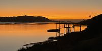 Sunrise on the Knysna Lagoon. March 3, 2023. Photographer: Herb Hunter